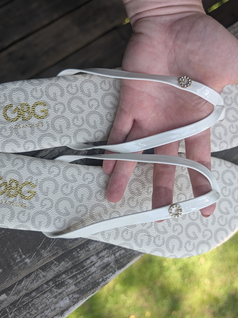 BCBG White Logo Print Patent Flip Flop Sandals